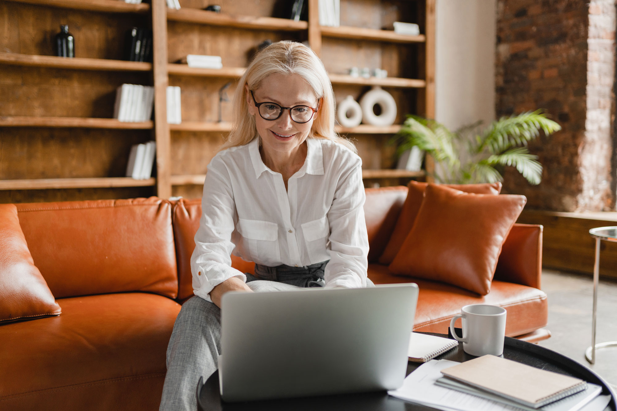 HelloID_Enhanced_Security_Compliance-happy-person-on-couch